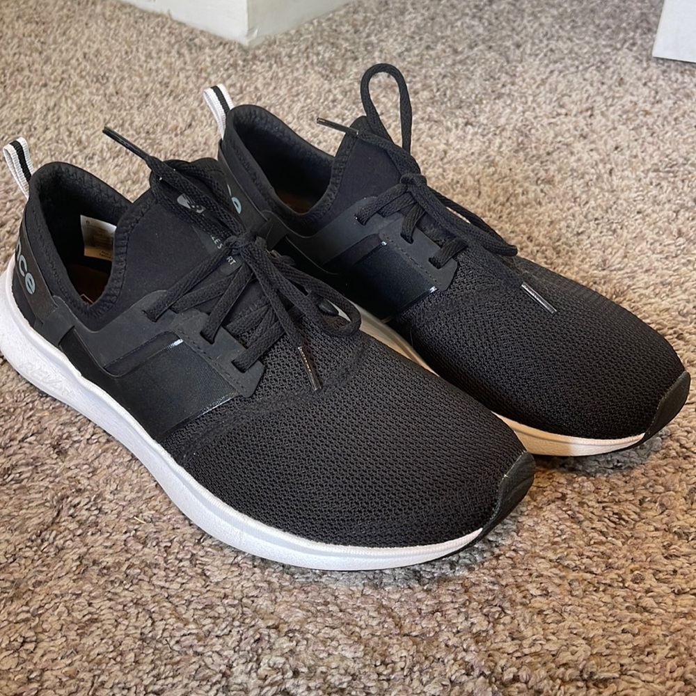 New Balance women’s tennis shoe- size 12- Black- worn once